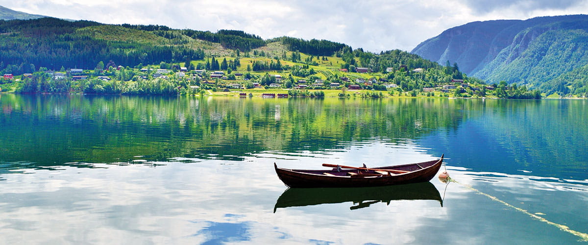 A small boat on the fjord in Ulvik, Norway